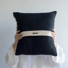 Load image into Gallery viewer, Our striped cushion is not like any other striped cushion. Thanks to special knitting techniques, three-dimensional fabric fold stripes are created.  Disclaimer: Every cushion is individually knitted and sewn by hand to ensure the highest level of comfort and long-lasting quality, which means you may find slight variations in design and size.  Cushion filling included. 43 x 43 cm 100% polyester