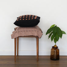 Load image into Gallery viewer, Offering an elegant and timeless design for your home with a different color on each side. This two-sided cushion gives you options to play with.  Disclaimer: Every cushion is individually knitted and sewn by hand to ensure the highest level of comfort and long-lasting quality, which means you may find slight variations in design and size.  Cushion filling included. 55 x 55 cm 100% polyester