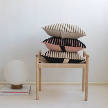 Load image into Gallery viewer, Our striped cushion is not like any other striped cushion. Thanks to special knitting techniques, three-dimensional fabric fold stripes are created.  Disclaimer: Every cushion is individually knitted and sewn by hand to ensure the highest level of comfort and long-lasting quality, which means you may find slight variations in design and size.  Cushion filling included. 43 x 43 cm 100% polyester