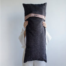 Load image into Gallery viewer, Add an organic element to your environment  with our long and cozy cushions.  Disclaimer: Every cushion is individually knitted and sewn by hand to ensure the highest level of comfort and long-lasting quality, which means you may find slight variations in design and size.  Cushion filling included. 35 x 85 cm 100% polyester