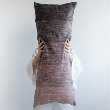 Load image into Gallery viewer, Add an organic element to your environment  with our long and cozy cushions.  Disclaimer: Every cushion is individually knitted and sewn by hand to ensure the highest level of comfort and long-lasting quality, which means you may find slight variations in design and size.  Cushion filling included. 35 x 85 cm 100% polyester

