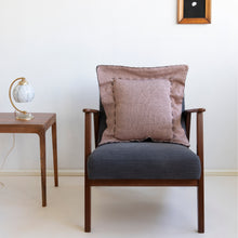 Load image into Gallery viewer, Offering an elegant and timeless design for your home with a different color on each side. This two-sided cushion gives you options to play with.  Disclaimer: Every cushion is individually knitted and sewn by hand to ensure the highest level of comfort and long-lasting quality, which means you may find slight variations in design and size.  Cushion filling included. 55 x 55 cm 100% polyester