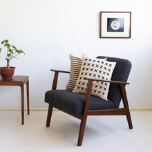 Load image into Gallery viewer, Our striped cushion is not like any other striped cushion. Thanks to special knitting techniques, three-dimensional fabric fold stripes are created.  Disclaimer: Every cushion is individually knitted and sewn by hand to ensure the highest level of comfort and long-lasting quality, which means you may find slight variations in design and size.  Cushion filling included. 43 x 43 cm 100% polyester