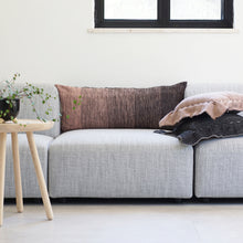 Load image into Gallery viewer, Add an organic element to your environment  with our long and cozy cushions.  Disclaimer: Every cushion is individually knitted and sewn by hand to ensure the highest level of comfort and long-lasting quality, which means you may find slight variations in design and size.  Cushion filling included. 35 x 85 cm 100% polyester
